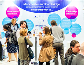 The CRUK Cambridge and Manchester Centres exhibition stand at the NCRI conference in Liverpool